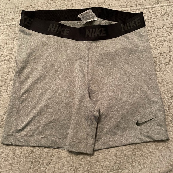 Nike Pants - Nike size large grey biker shorts
